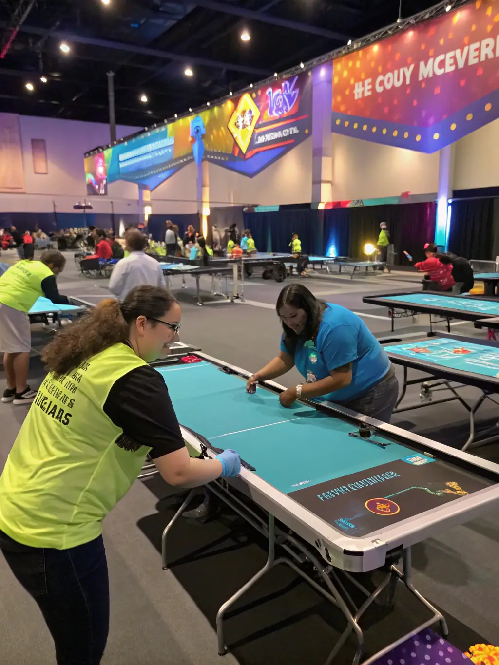 A group of GONEXTFAST volunteers assisting with a community gaming event, emphasizing the organization's commitment to social engagement.