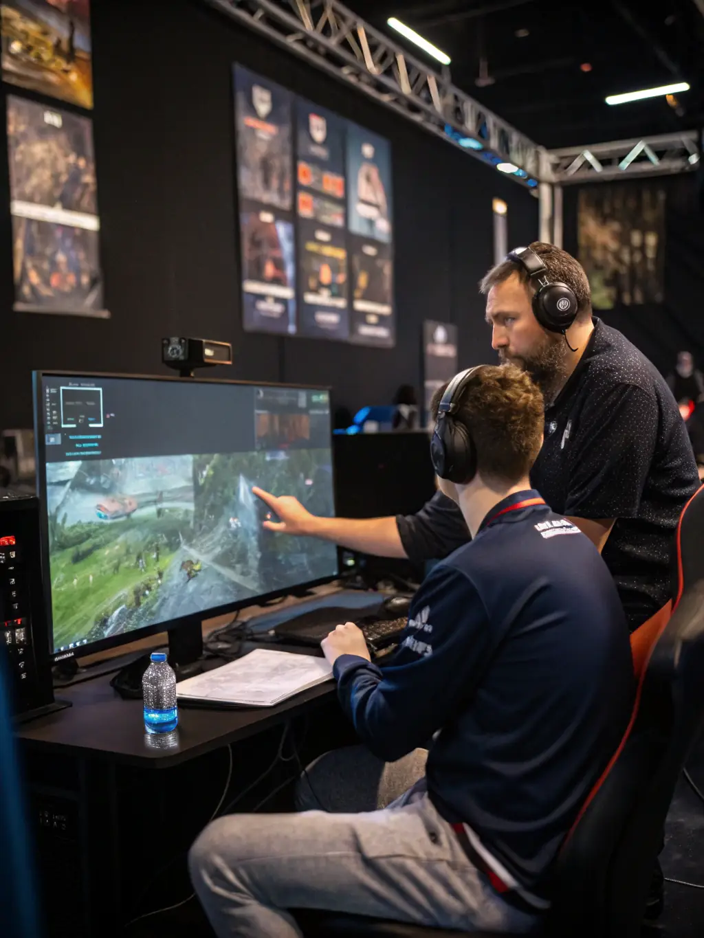 A GONEXTFAST coach providing personalized feedback to a young esports player, focusing on skill enhancement and strategic thinking.